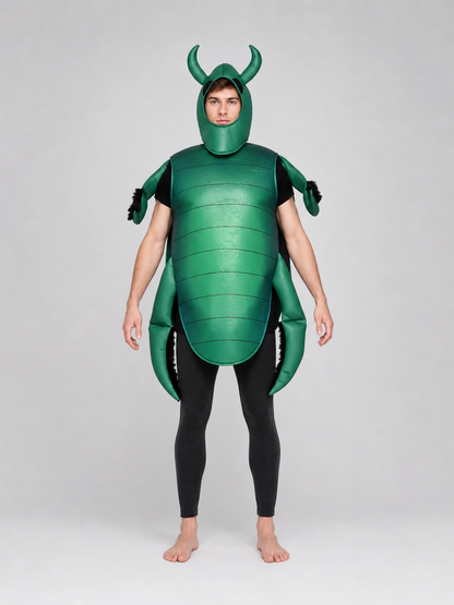 The beetle costume features a full-body insect silhouette with a large segmented green panel on the abdomen. The look is completed by a curved headpiece resembling horns, along with green side and hand elements that imitate insect limbs. Th