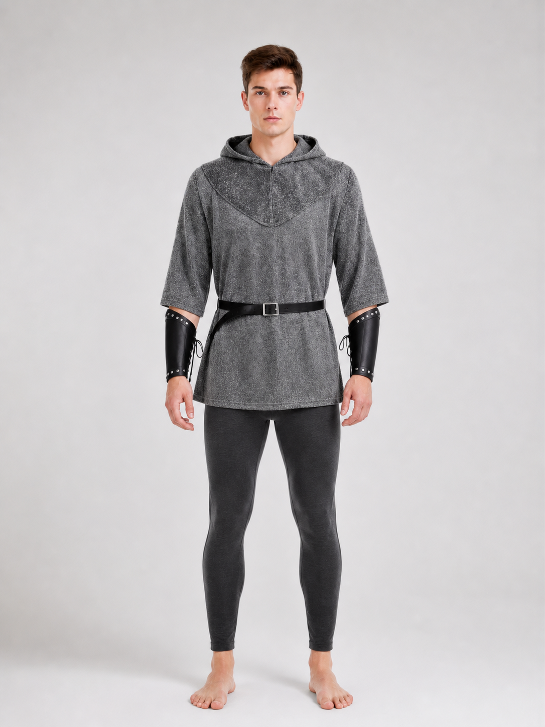 The costume is designed in the style of a medieval knight and is suitable for cosplay and stage performances. The set includes a gray hooded top with a layered front design, black pants, a belt, bracers, and greaves. The gray-and-black colo