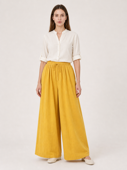 Mustard-colored wide-leg pants