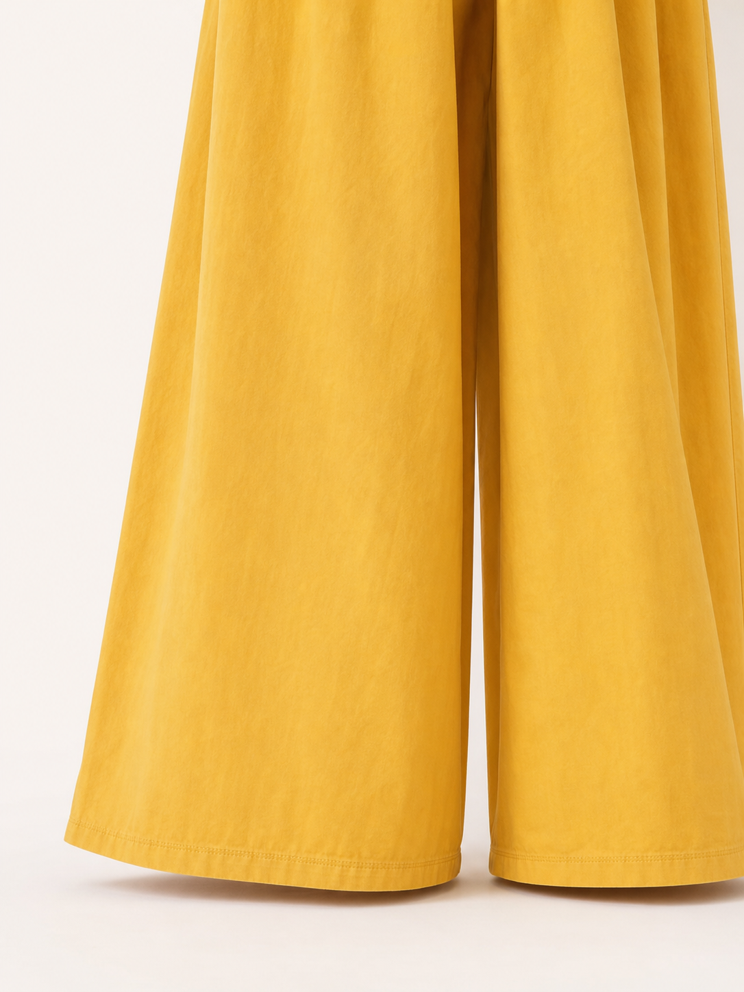 Mustard-colored wide-leg pants with long pant legs