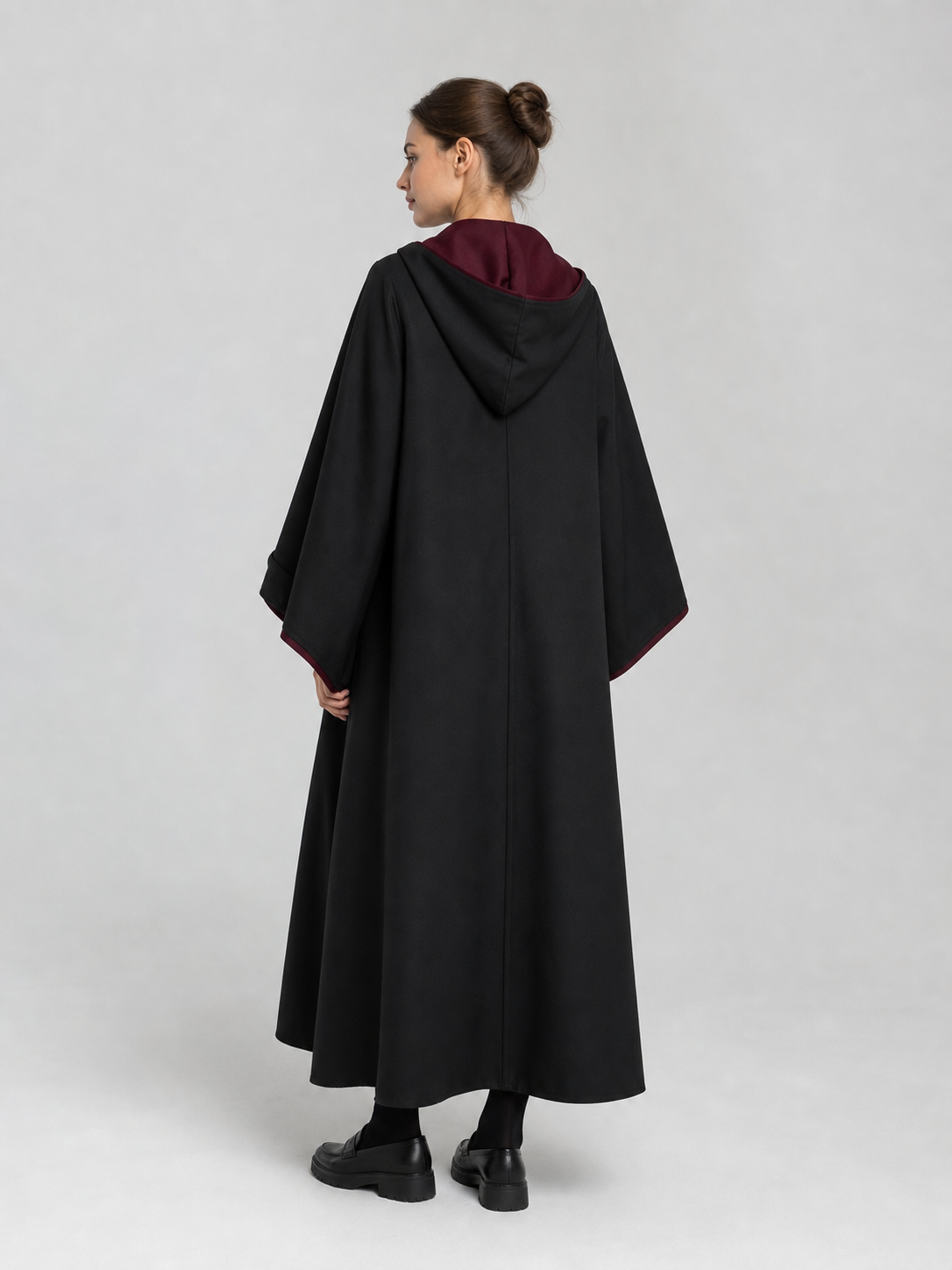 Black wizard cloak with emblem and wand