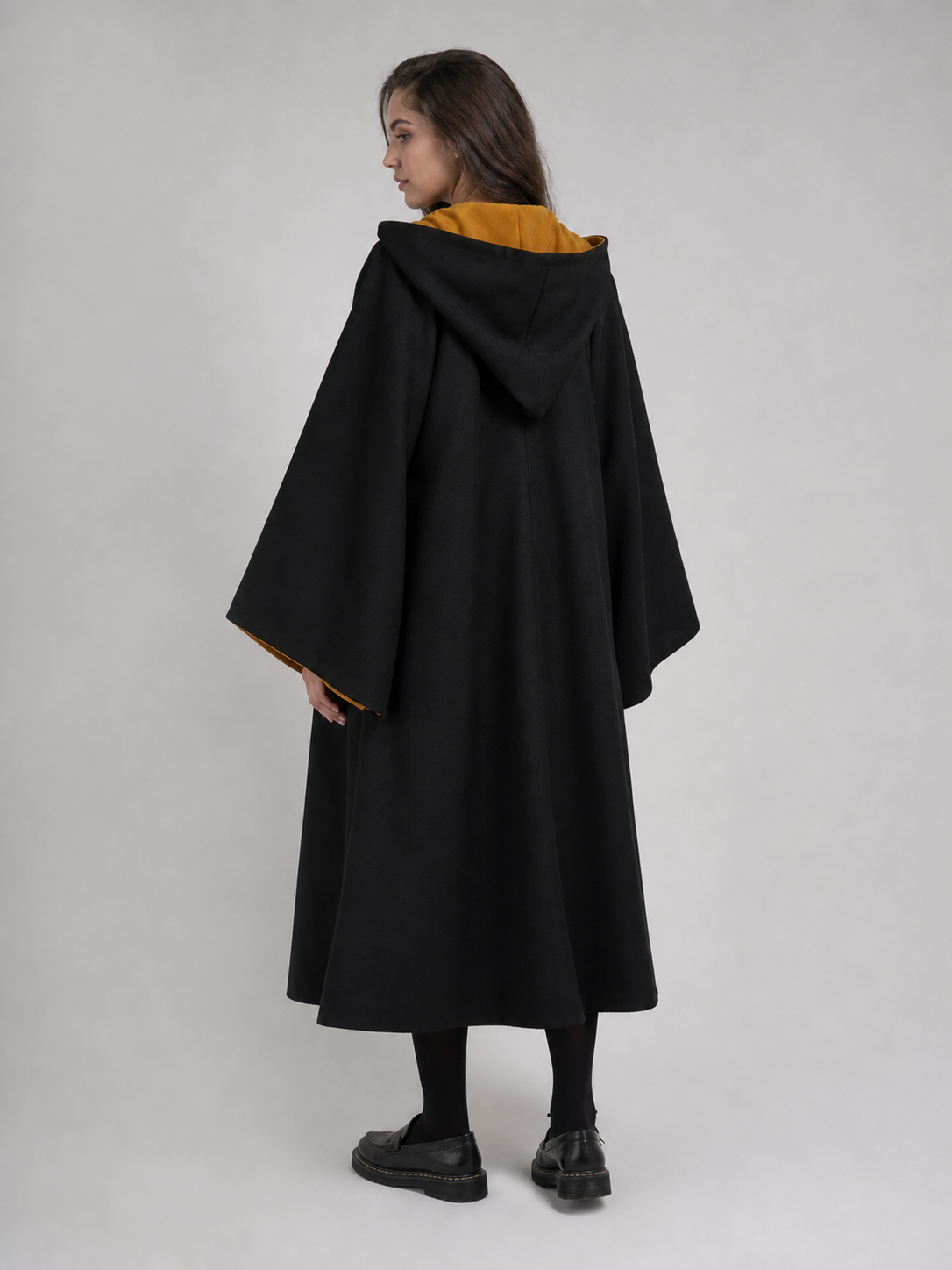 Black-and-yellow costume cape with hood