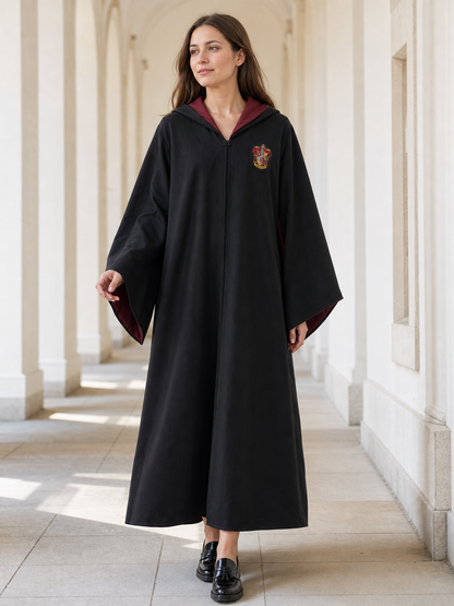 Black wizard cloak with emblem and wand