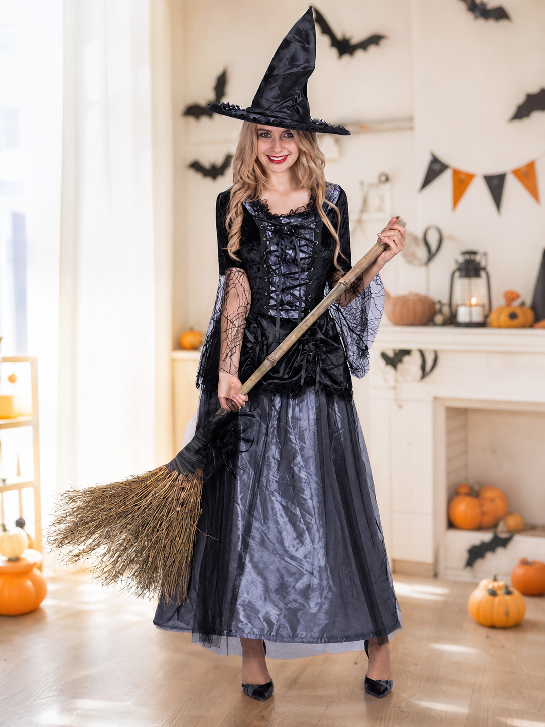 Gothic-style witch costume dress with hat for themed events. The design is mainly black and dark gray, with patterned textured fabric and sheer black accents. The look is centered on a long dress with a fitted lace-up corset, a ruffled neck