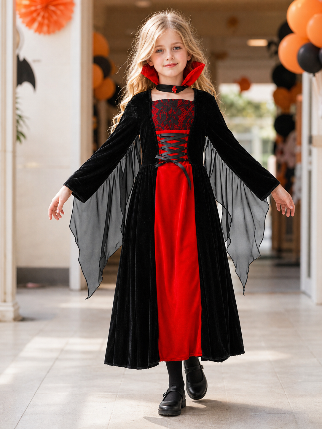 Halloween vampire costume with long dress and cape