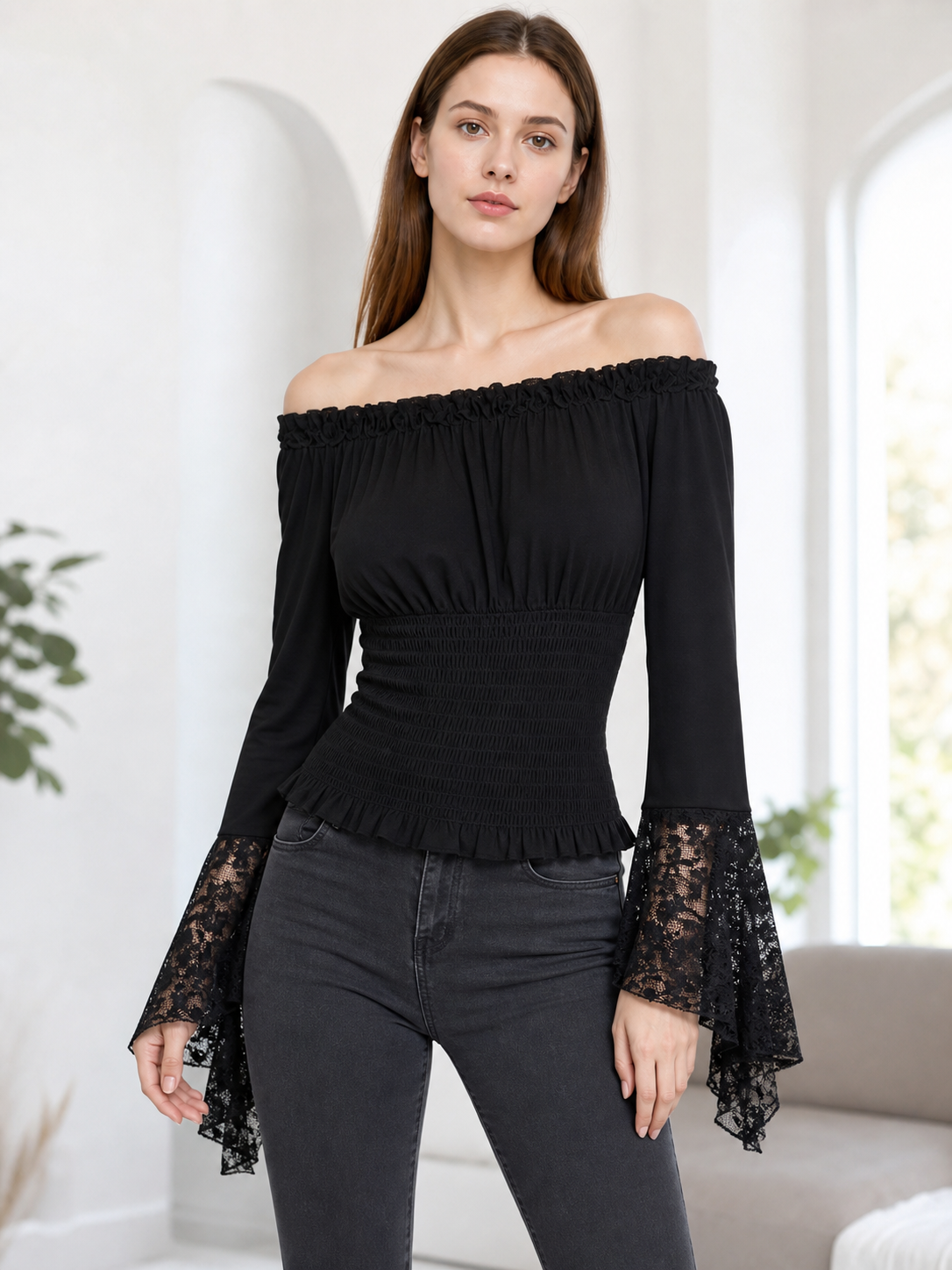 Black off-the-shoulder blouse with ruffles and long sleeves