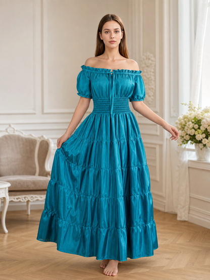 Romantic medieval-style maxi dress. This style features an off-the-shoulder neckline with a gathered elastic edge, short puff sleeves, and a fitted waist with gathering. The long floor-length skirt is made up of several tiers with soft gath