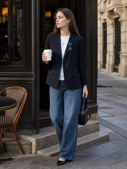 Women's black blazer with lapels and a tailored fit