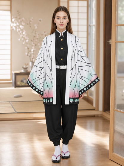 The set is designed in anime cosplay style and includes several pieces for creating a striking look. The main piece is a long white cloak with wide, loose-flowing sleeves. A graphic black pattern runs across the cloak, resembling branches o