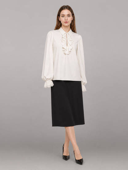 White blouse with a high collar and ruffles