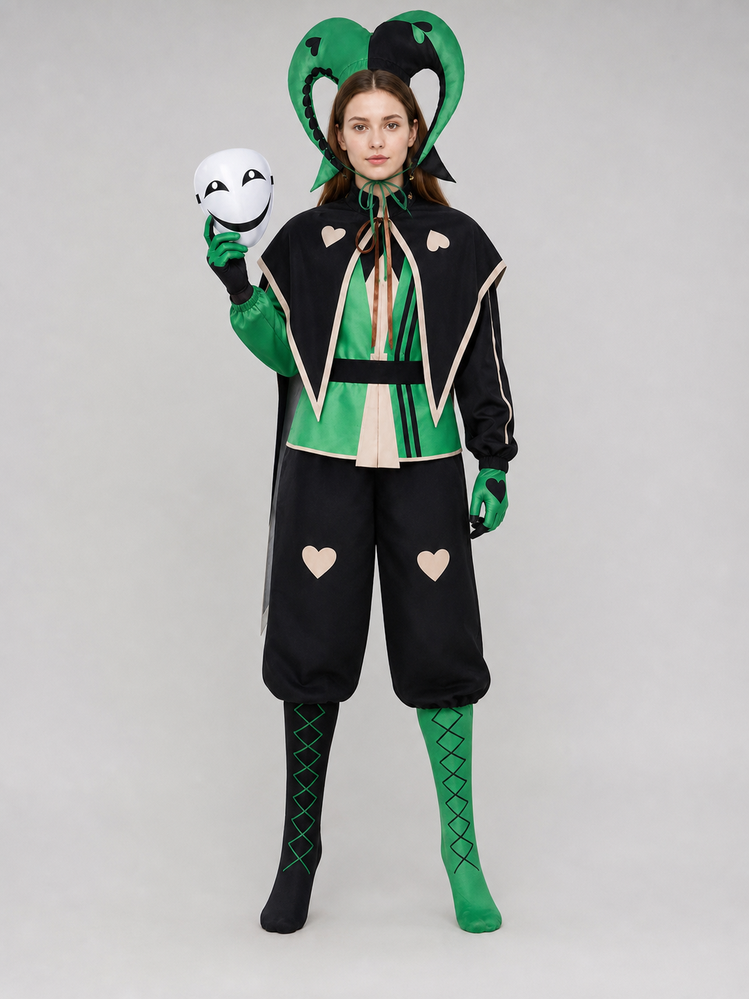 Theatrical clown jester costume in a black-and-green style for cosplay. The set is designed in an harlequin aesthetic and includes a black-and-green one-piece outfit with long sleeves, contrasting cream trim, and geometric panels. Heart-sha