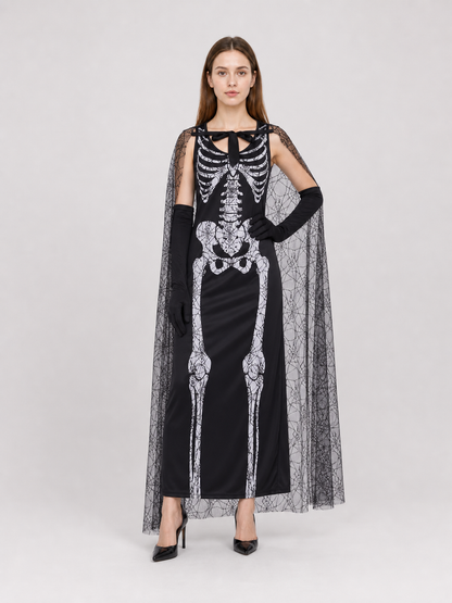 Gothic Halloween costume dress with accessories: a sleeveless black dress with a white rib and pelvic bone print, a sheer cape or veil with a spiderweb design, black gloves, and a necktie or bow detail. The look is done in black and white w