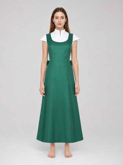 The green Kushina Uzumaki cosplay pinafore dress is designed in the recognizable style of the character from the anime Naruto: Shippuden. The design is a green pinafore dress with a square neckline, wide straps, and open pockets on the side