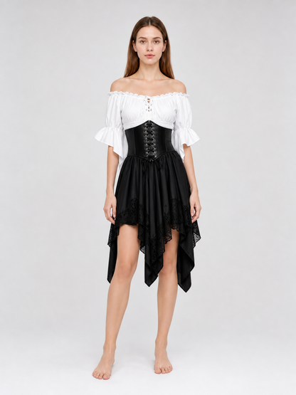 The set is designed in a theatrical pirate style and consists of a white cropped off-the-shoulder top with voluminous puff sleeves, a black corset with front lacing and metal eyelets, and a black asymmetrical skirt with elongated pointed pa