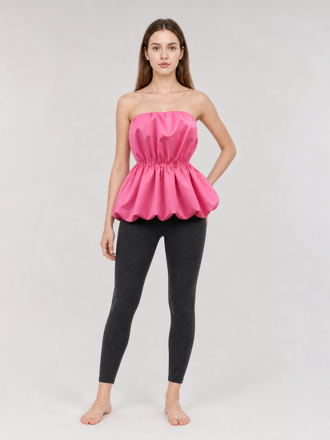 Strapless bustier top with peplum, bright pink