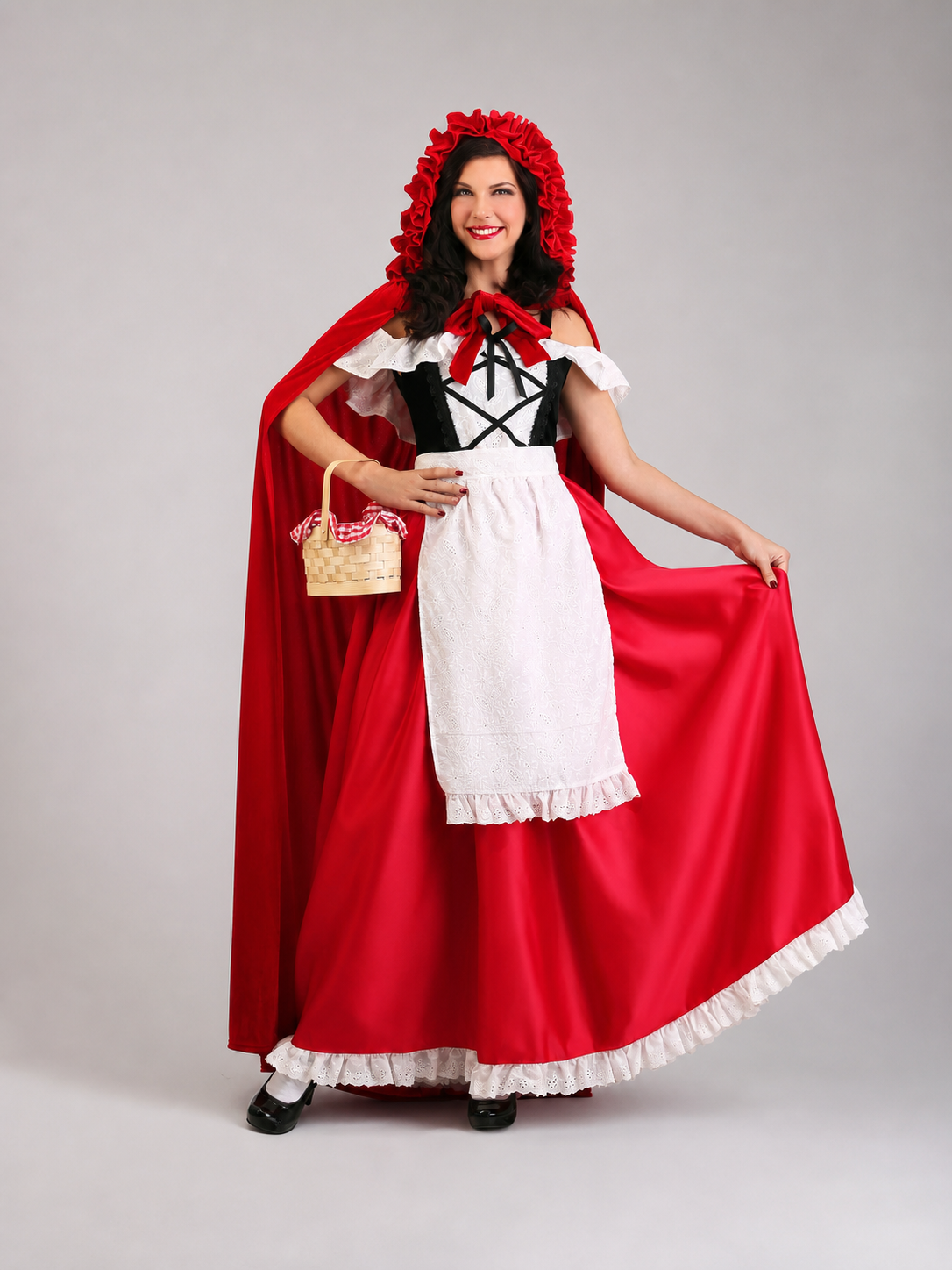 Red Riding Hood costume set designed as a dress with a cape, suitable for stage performances, festive dress-up, and themed cosplay. The set includes a costume combining a red dress with a full silhouette, a white apron-style front, and a re