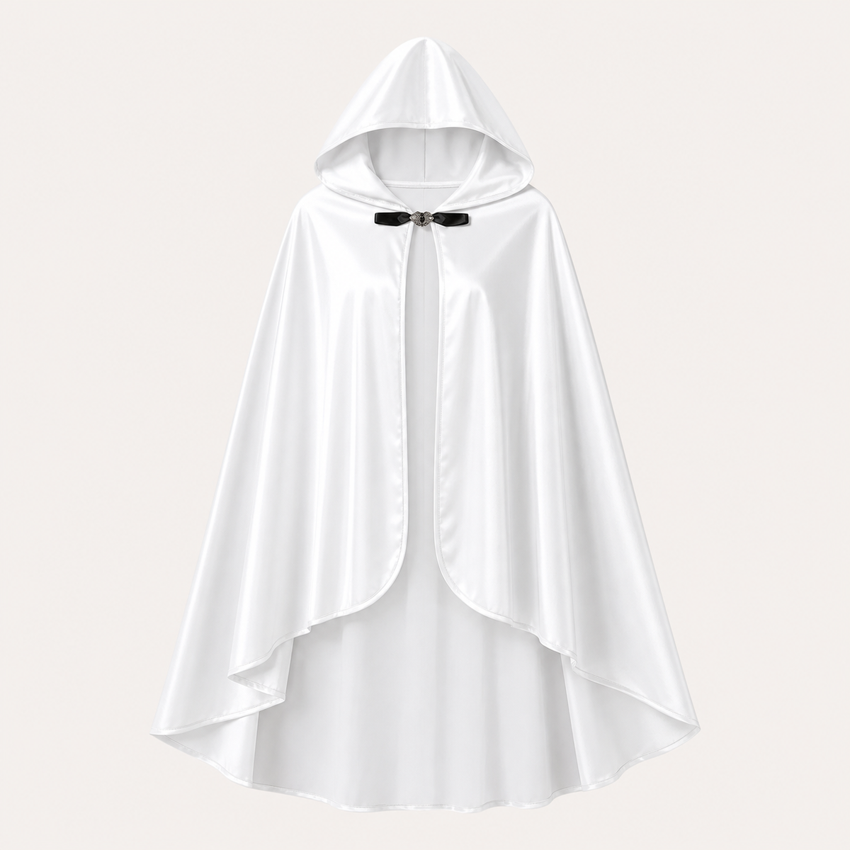 White hooded cape displayed alone against a light background, showing the satin-look fabric, rounded front edges, layered hem, and black toggle