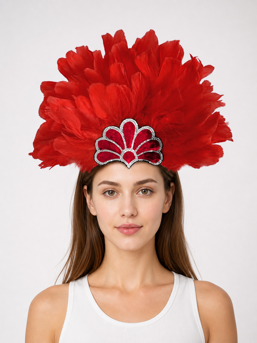 Information card about creating an expressive look, featuring a model wearing the red feather headpiece