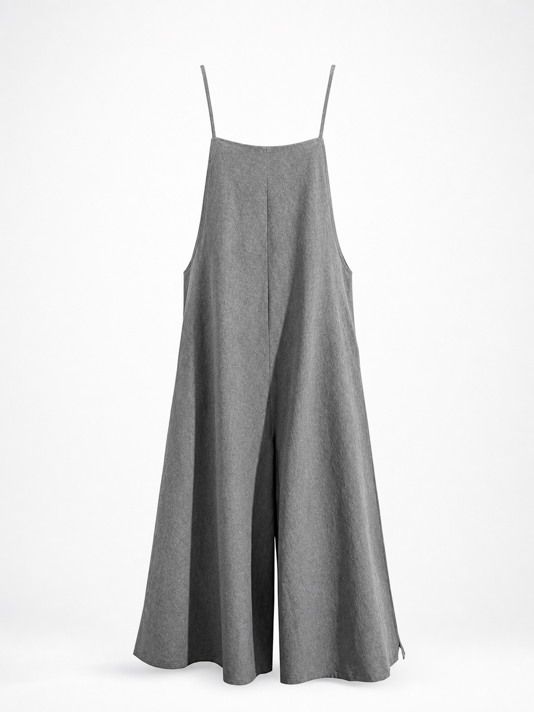 Gray wide-leg jumpsuit displayed on a stand against a white background, showing thin straps, side pockets, and a flowing silhouette