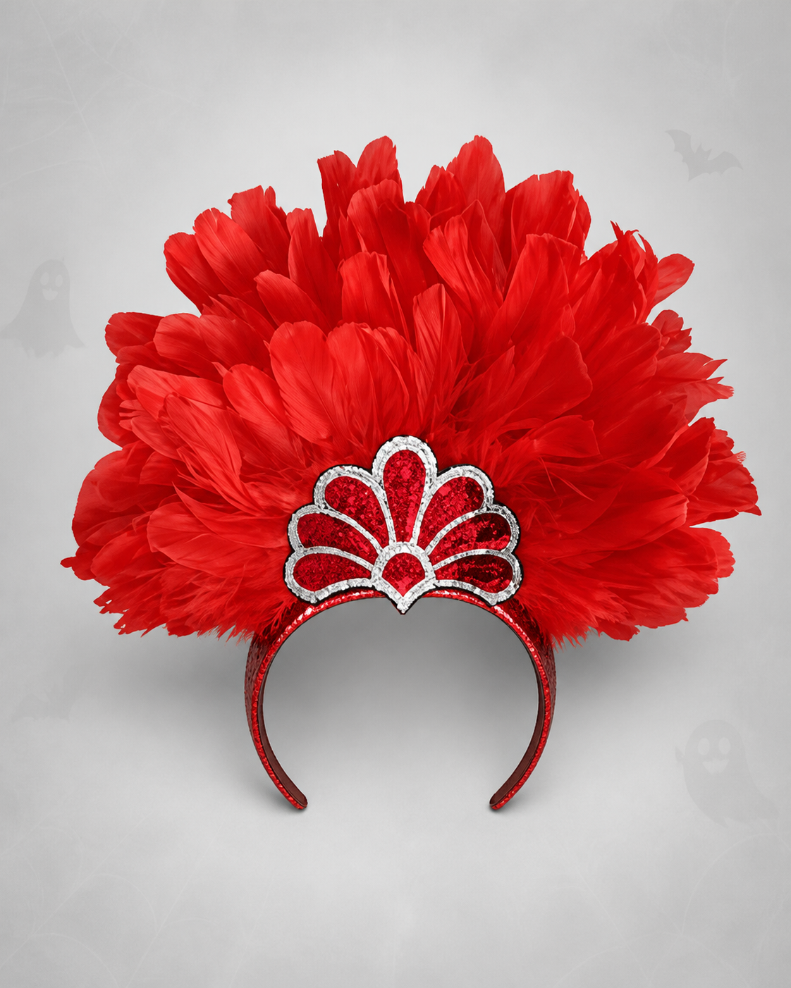 Red feather headband with a silver-trimmed fan decoration, shown from the front against a gray background