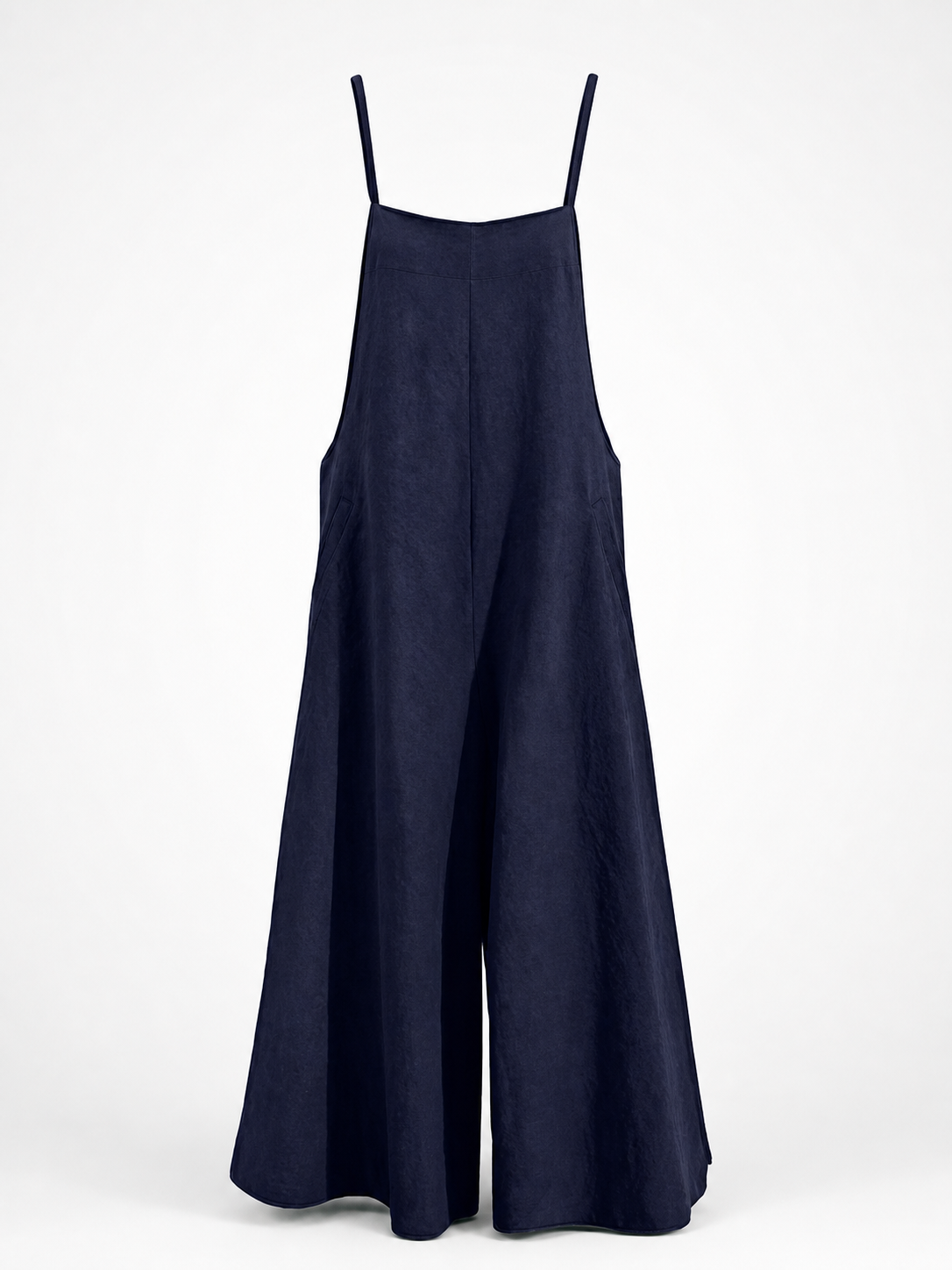 Dark blue wide-leg jumpsuit displayed flat, showing thin straps, straight neckline, side pockets, and flowing legs
