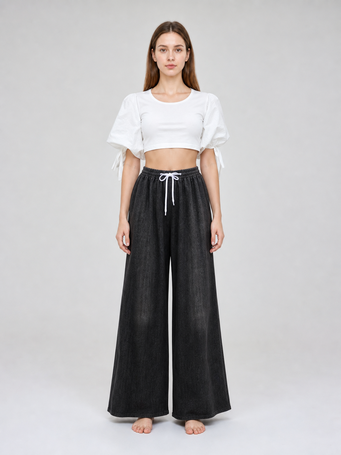Solid Black Wide-Leg Pants with Elastic Waist and Contrast White Drawstrings on-model view