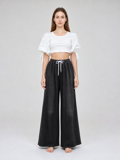 Solid Black Wide-Leg Pants with Elastic Waist and Contrast White Drawstrings on-model view