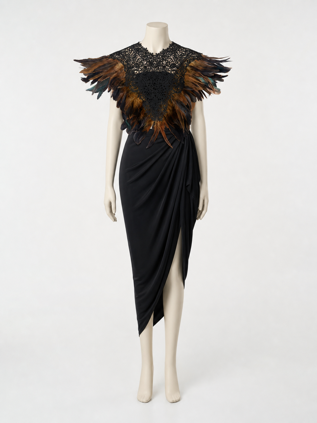 Black lace feather cape with brown and black layered feathers, displayed on a full mannequin over a draped black dress