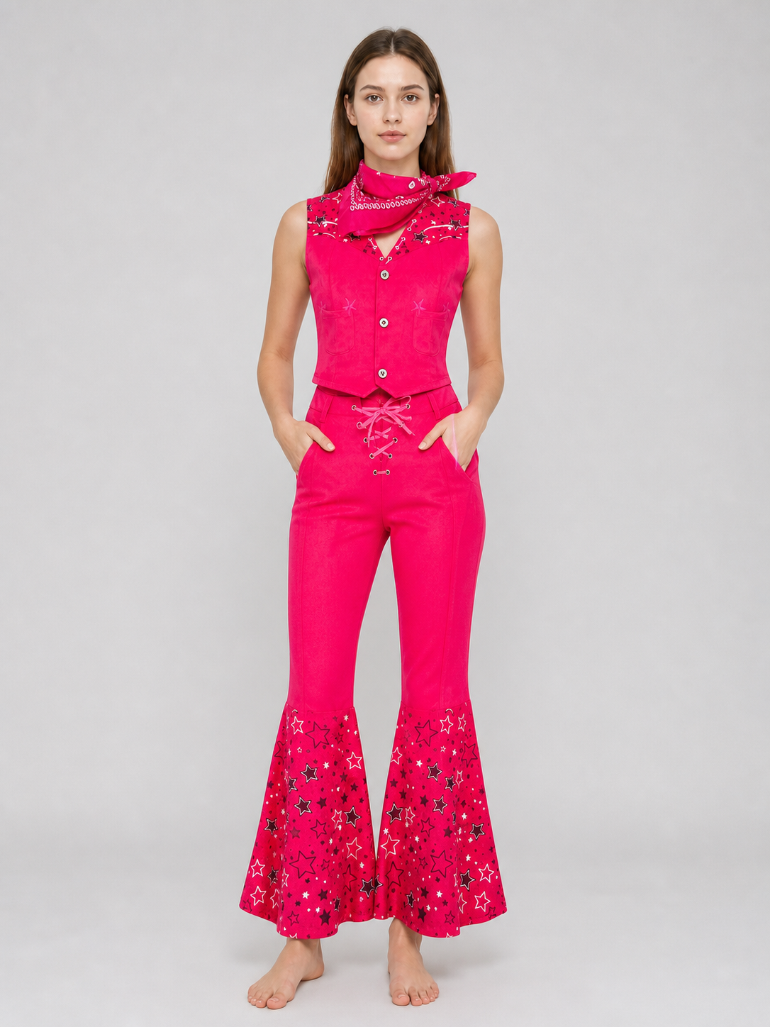 Barbie-style cosplay set consisting of two pieces: a cropped sleeveless top and flared-leg pants. The top resembles a vest with a front button closure, a decorative yoke, and a styled collar area. The pants have a high waist, front lacing, 