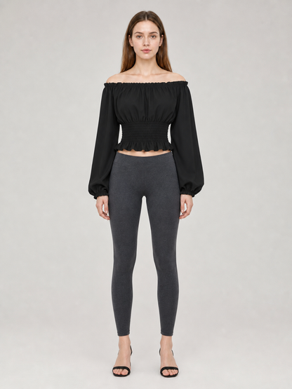 Black off-the-shoulder blouse with ruffles