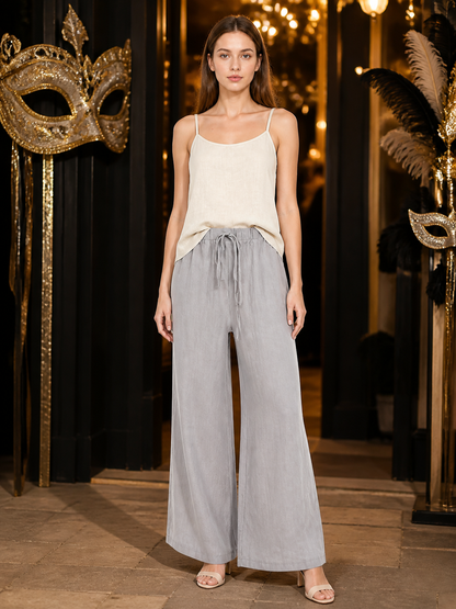 Gray wide-leg jeans with a drawstring and elastic waistband on-model view