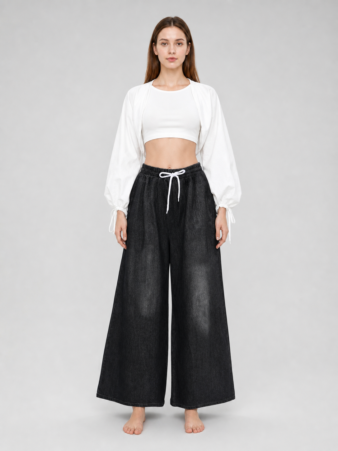 Solid Black Wide-Leg Pants with Elastic Waist and Contrast White Drawstrings on-model view 2