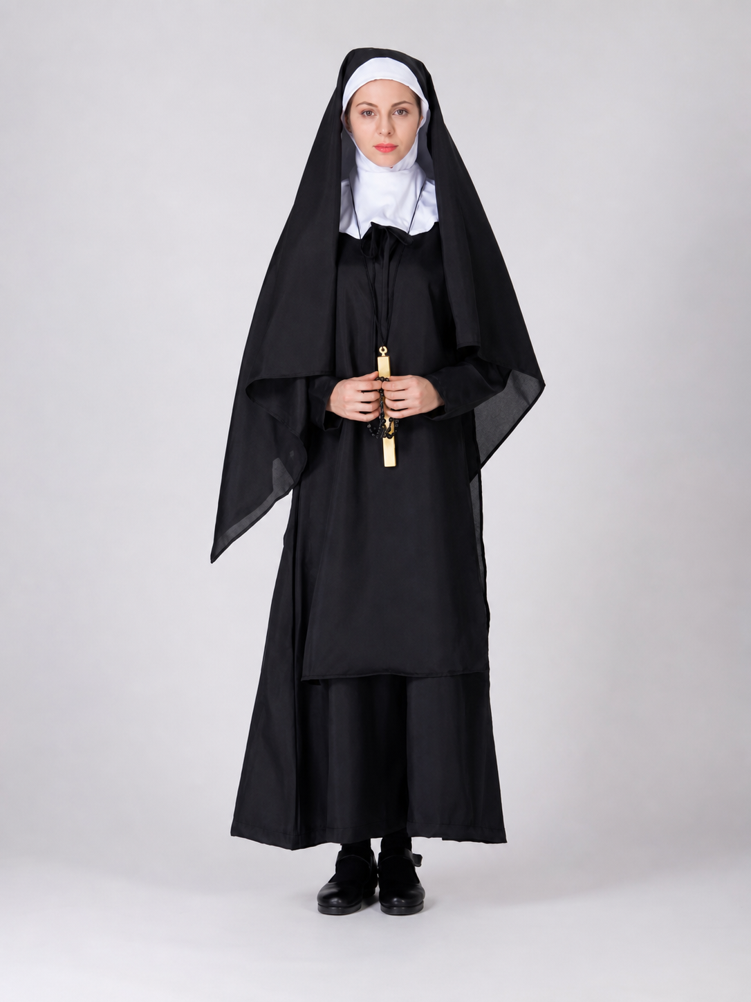 Religious-style costume with veil and cape