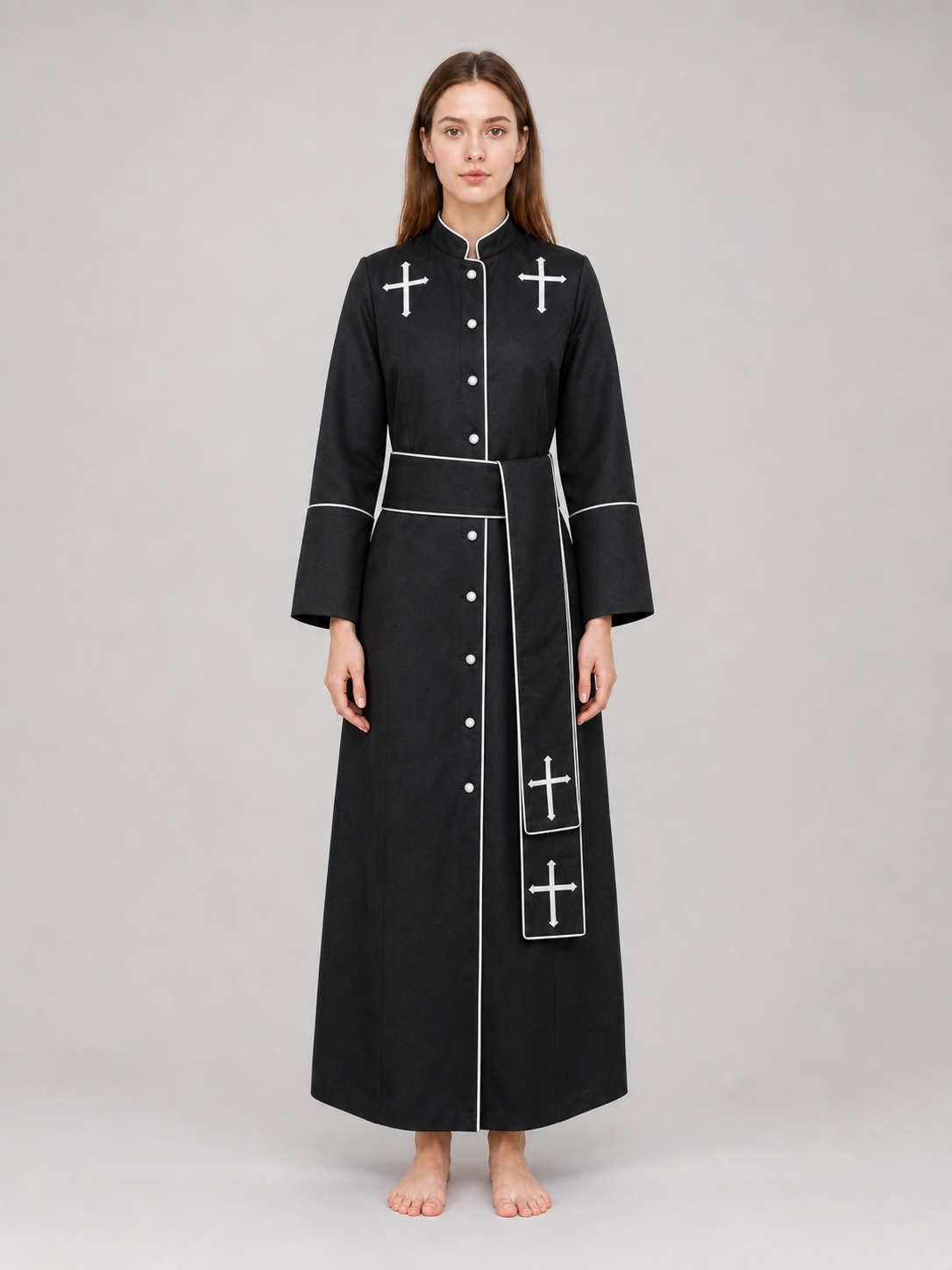 The model is designed in black and styled as a costume for cosplay, Halloween, and masquerades. It is a black cassock with a front featuring white buttons, a stand-up collar, and long sleeves. White crosses are placed on the garment: one is
