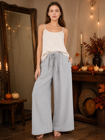 Gray wide-leg jeans with a drawstring and elastic waistband on-model view 3