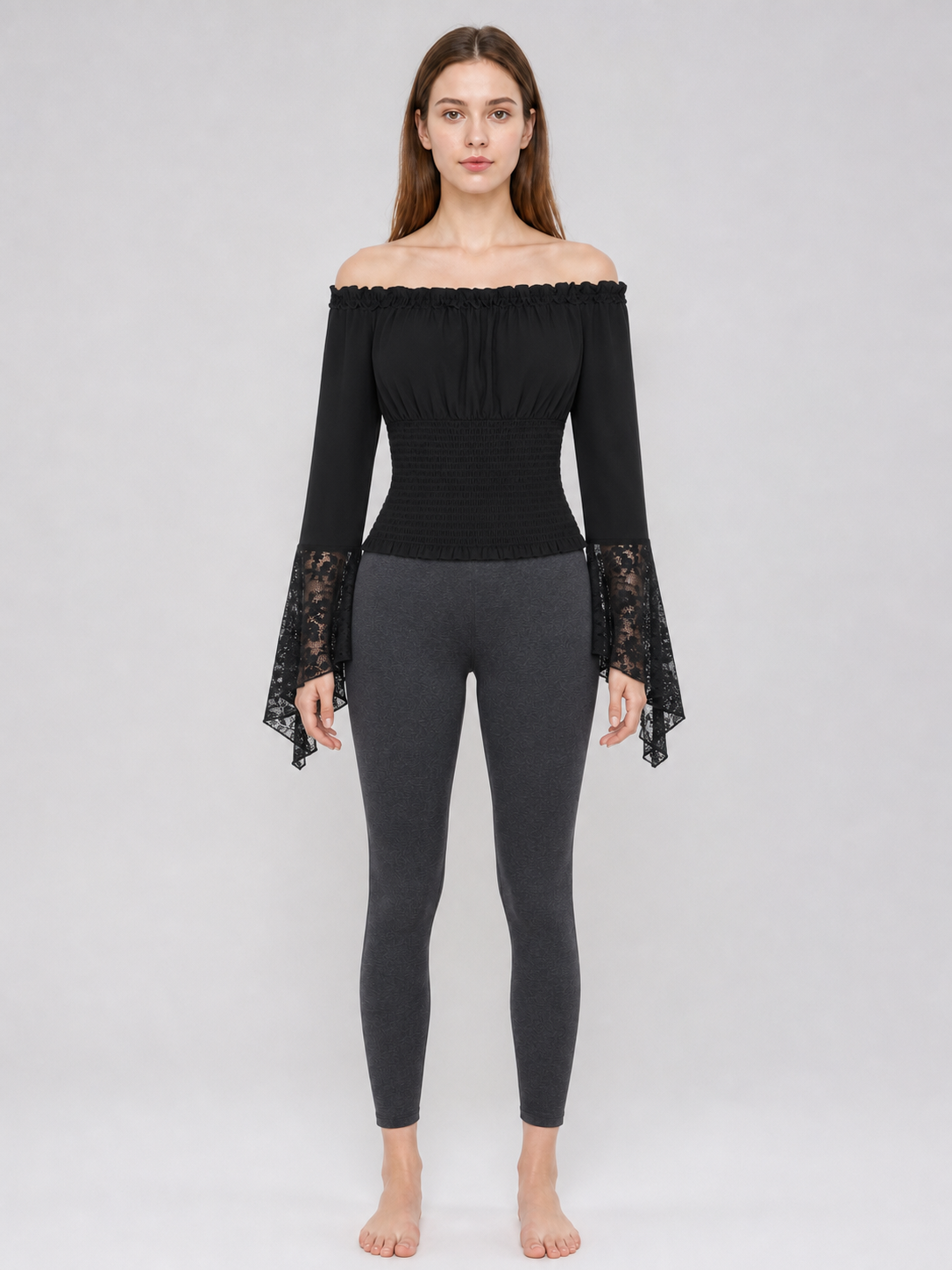 Black off-the-shoulder blouse with ruffles and long sleeves