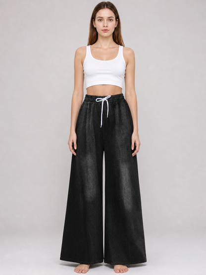 Solid Black Wide-Leg Pants with Elastic Waist and Contrast White Drawstrings on-model view 3