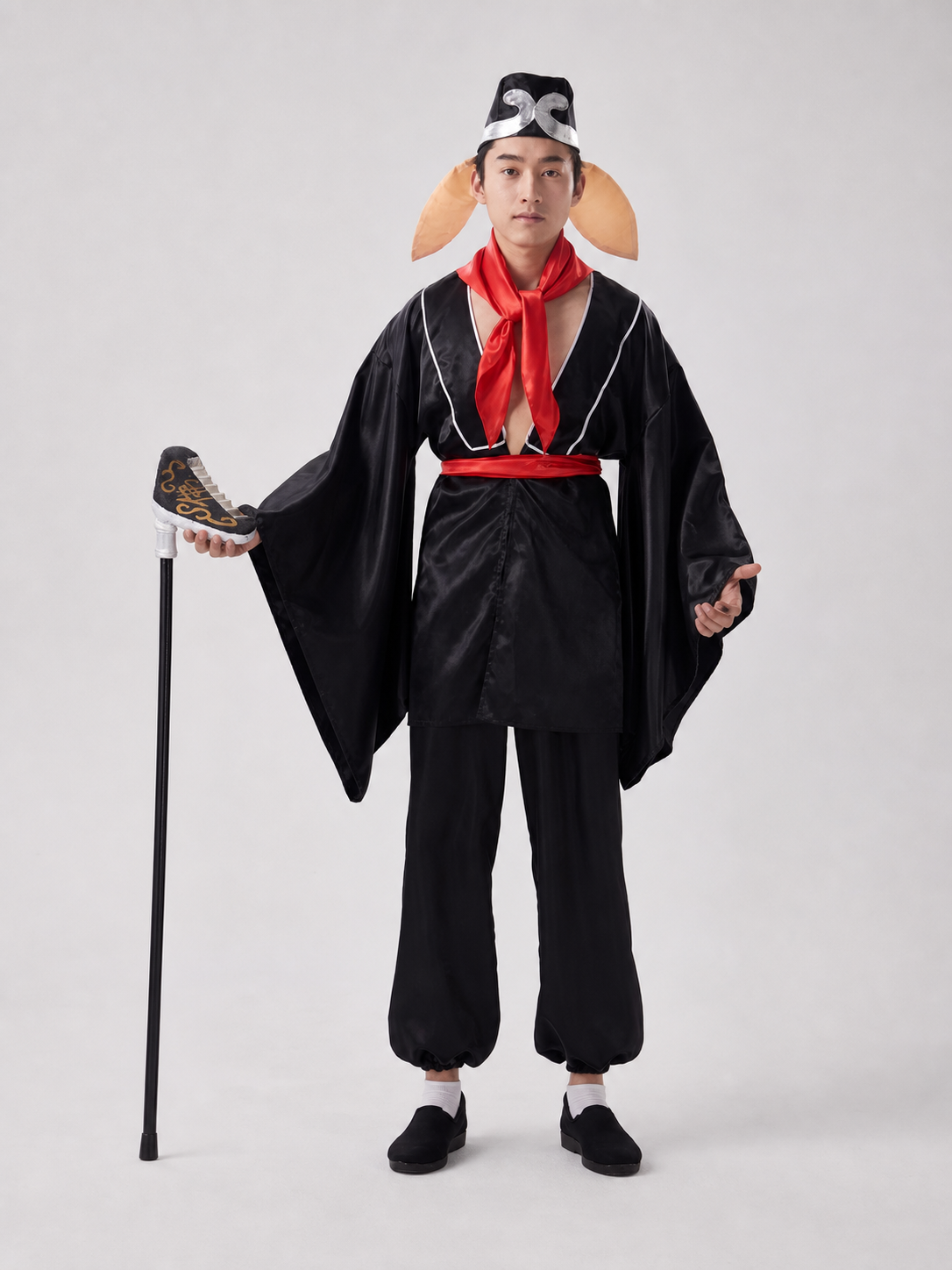 Carnival costume of a character with a mask and a pitchfork