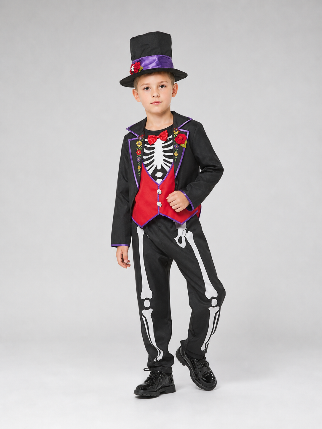 This skeleton costume is designed in the Mexican style of the Day of the Dead celebration. The outfit includes a black jacket with purple trim and floral decorations, a red vest-style front panel with decorative buttons, a red bow tie, blac