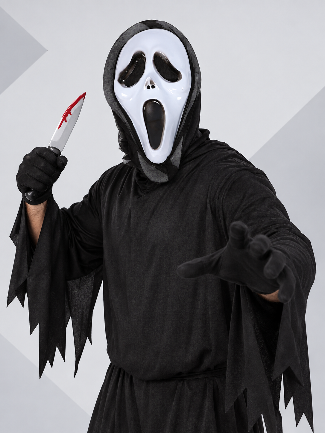 White mask with an elongated face shape and black cutouts