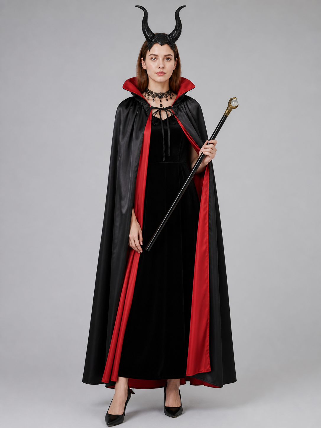 Costume set with a cape, horned headband, and wand Costume Capes detail