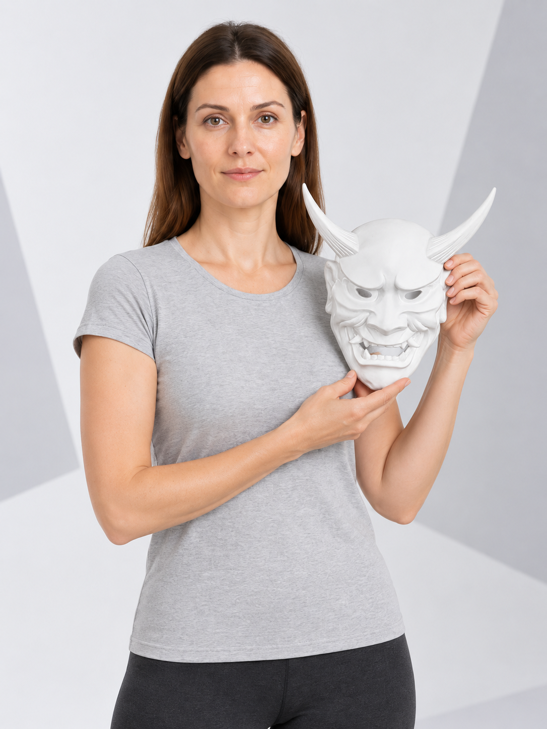White demonic mask with horns and fangs