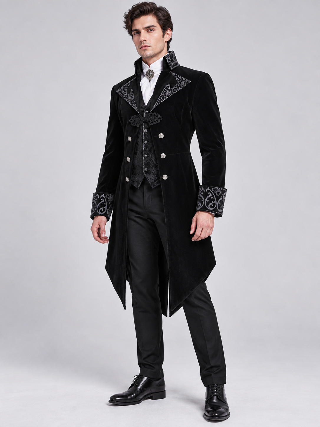 Black tailcoat with a high collar and silver embroidery