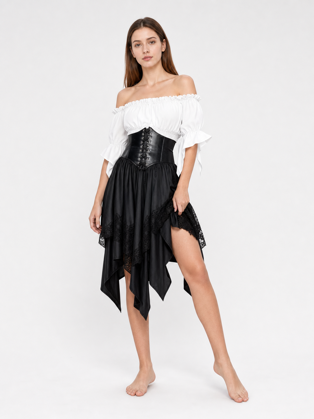 The set is designed in a theatrical pirate style and consists of a white cropped off-the-shoulder top with voluminous puff sleeves, a black corset with front lacing and metal eyelets, and a black asymmetrical skirt with elongated pointed pa