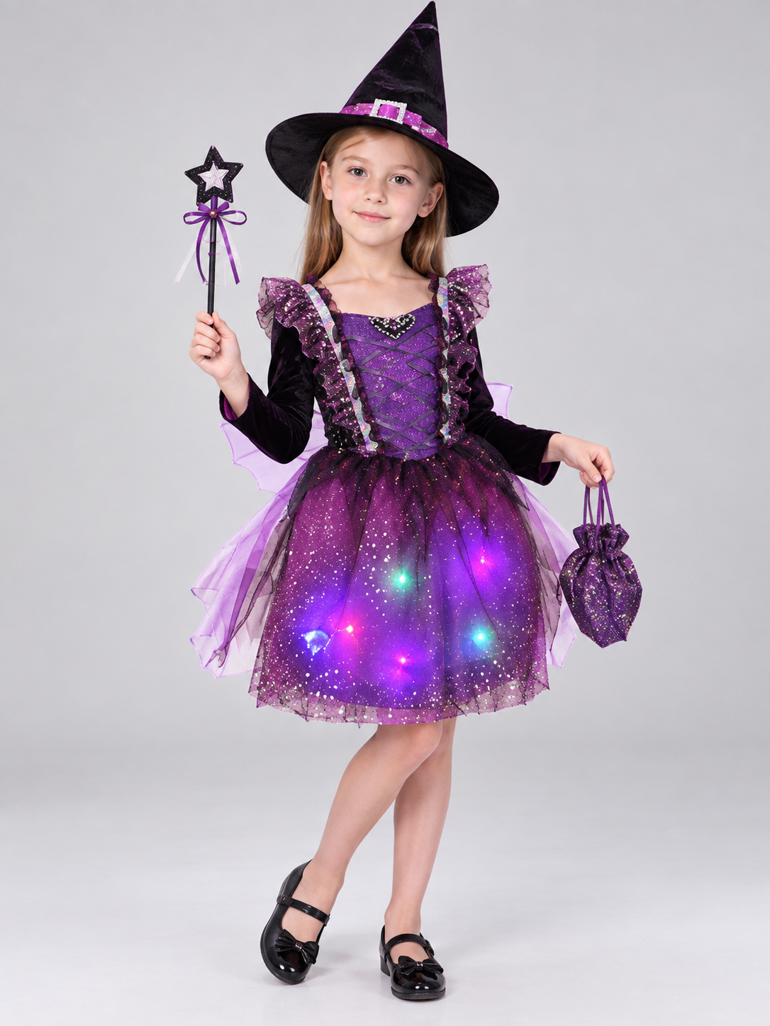 Kids' witch carnival costume with a glowing skirt