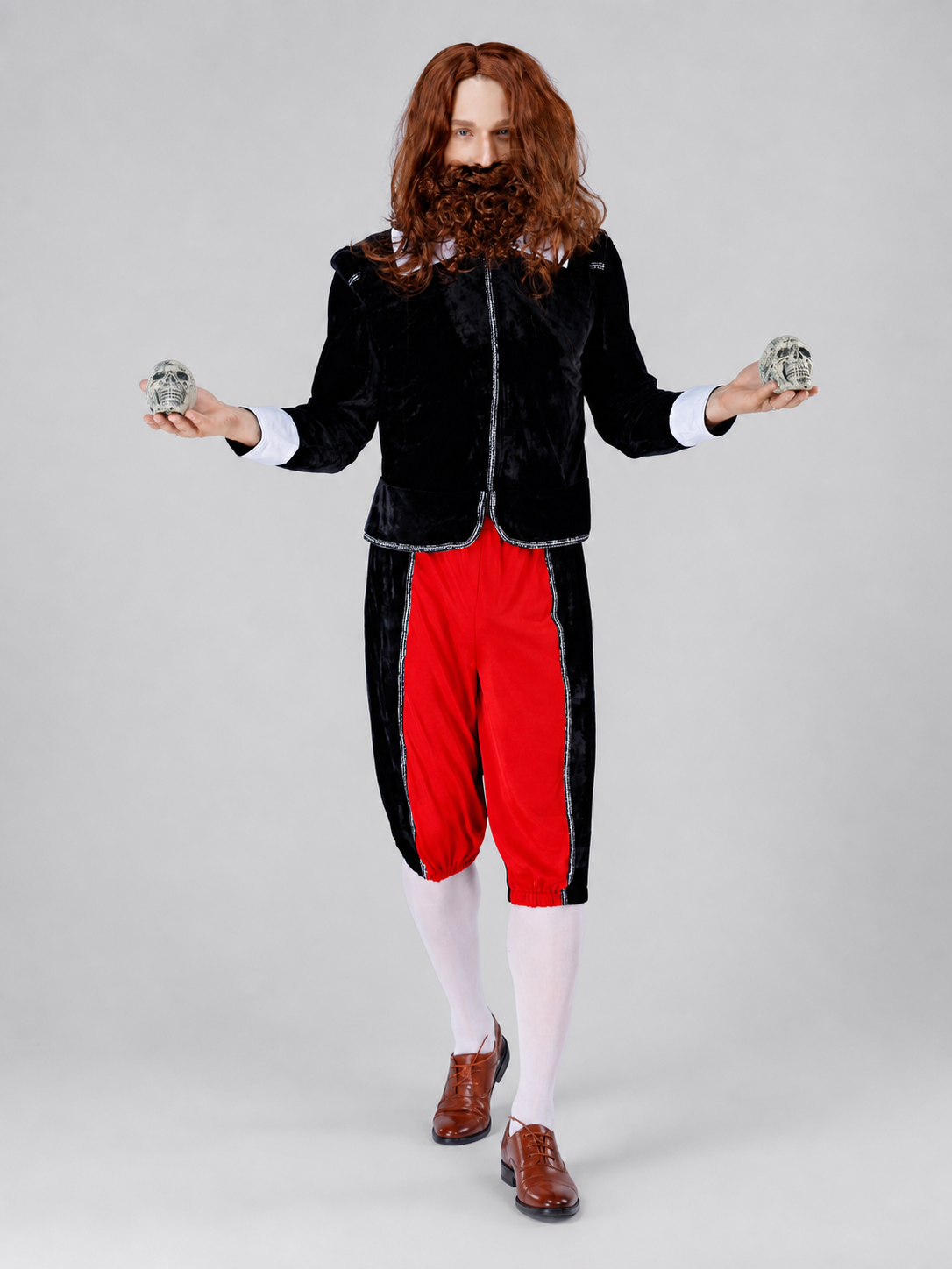 The vampire costume features a combination of black, red, and silver colors. The set includes a black long coat with long sleeves and red pants, combined to create a themed outfit. The front of the coat has a zipper running down the center.