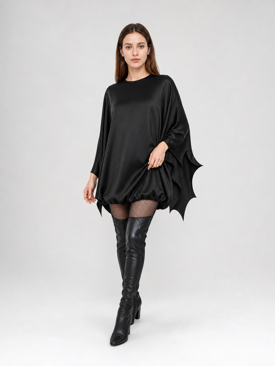Black bat costume dress with a headband and ears for themed events. The design Costume Dresses detail