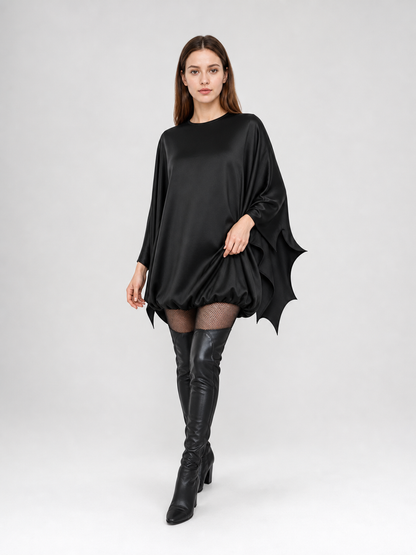 Black bat costume dress with a headband and ears for themed events. The design Costume Dresses detail
