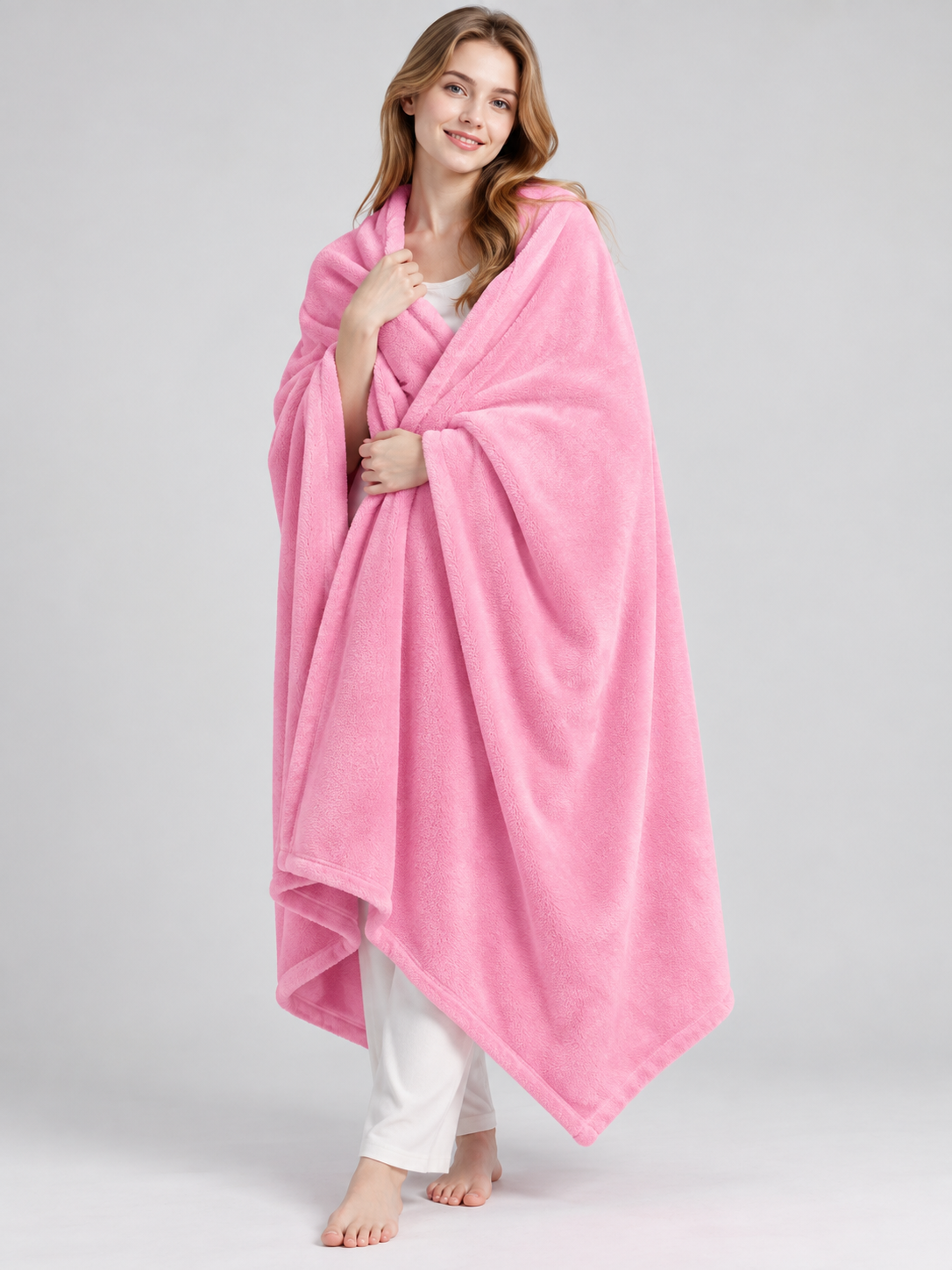 Pink solid-color blanket with a soft fuzzy surface