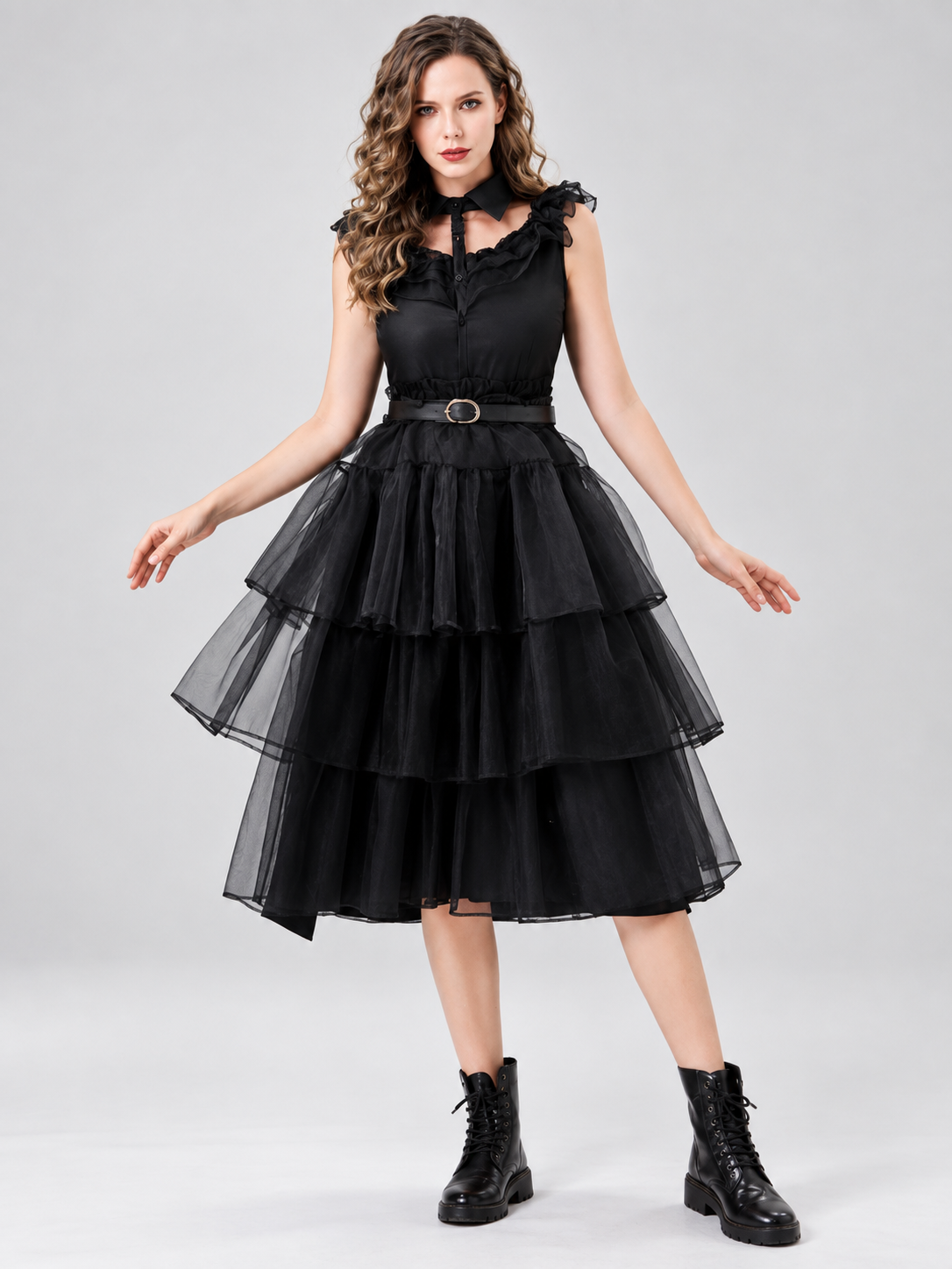 Black sleeveless dress with ruffles and a tiered skirt